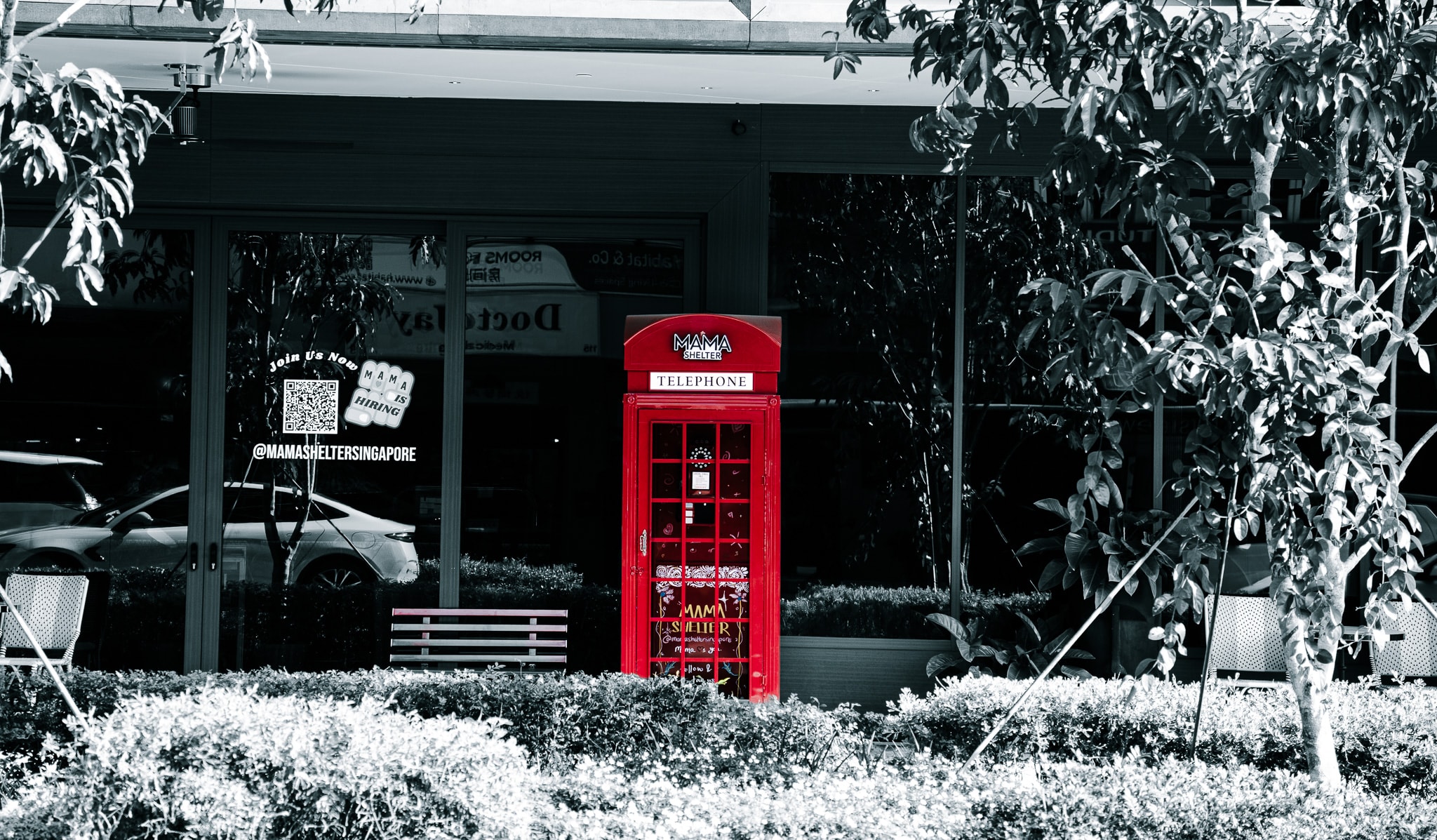 Red telephone booth storefront entrance