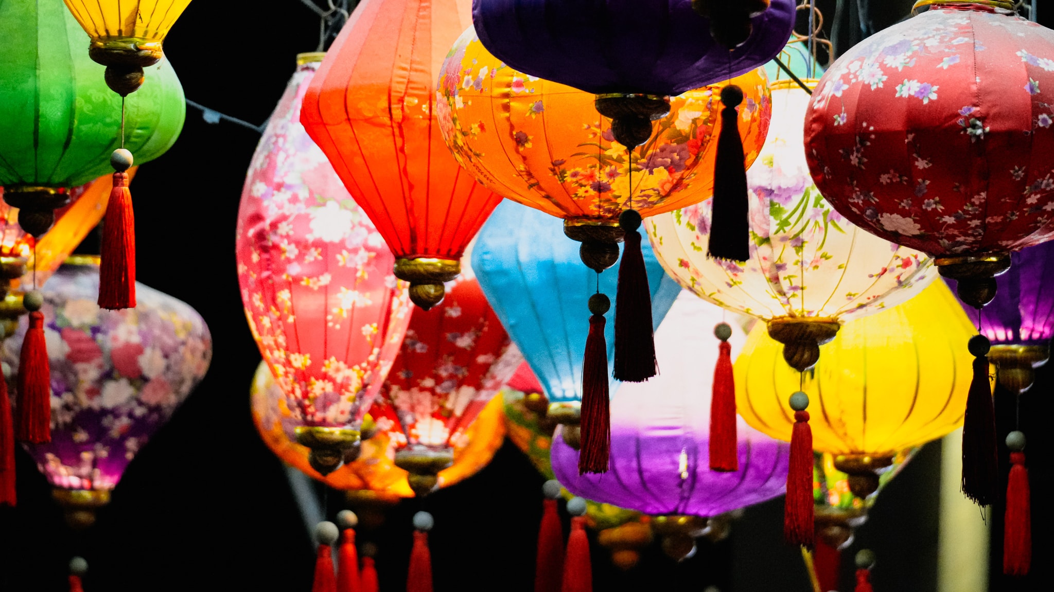 Colourful hanging lanterns with tassels