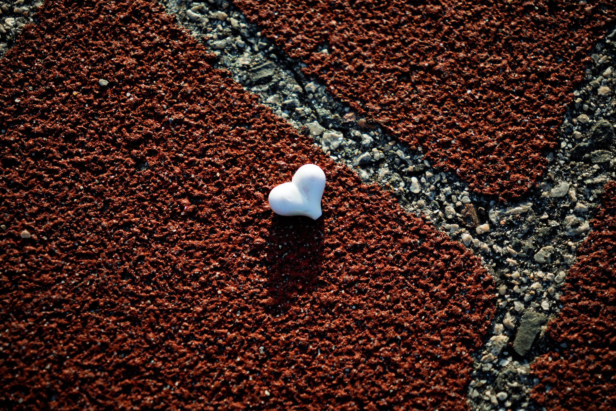 White heart on red pavement